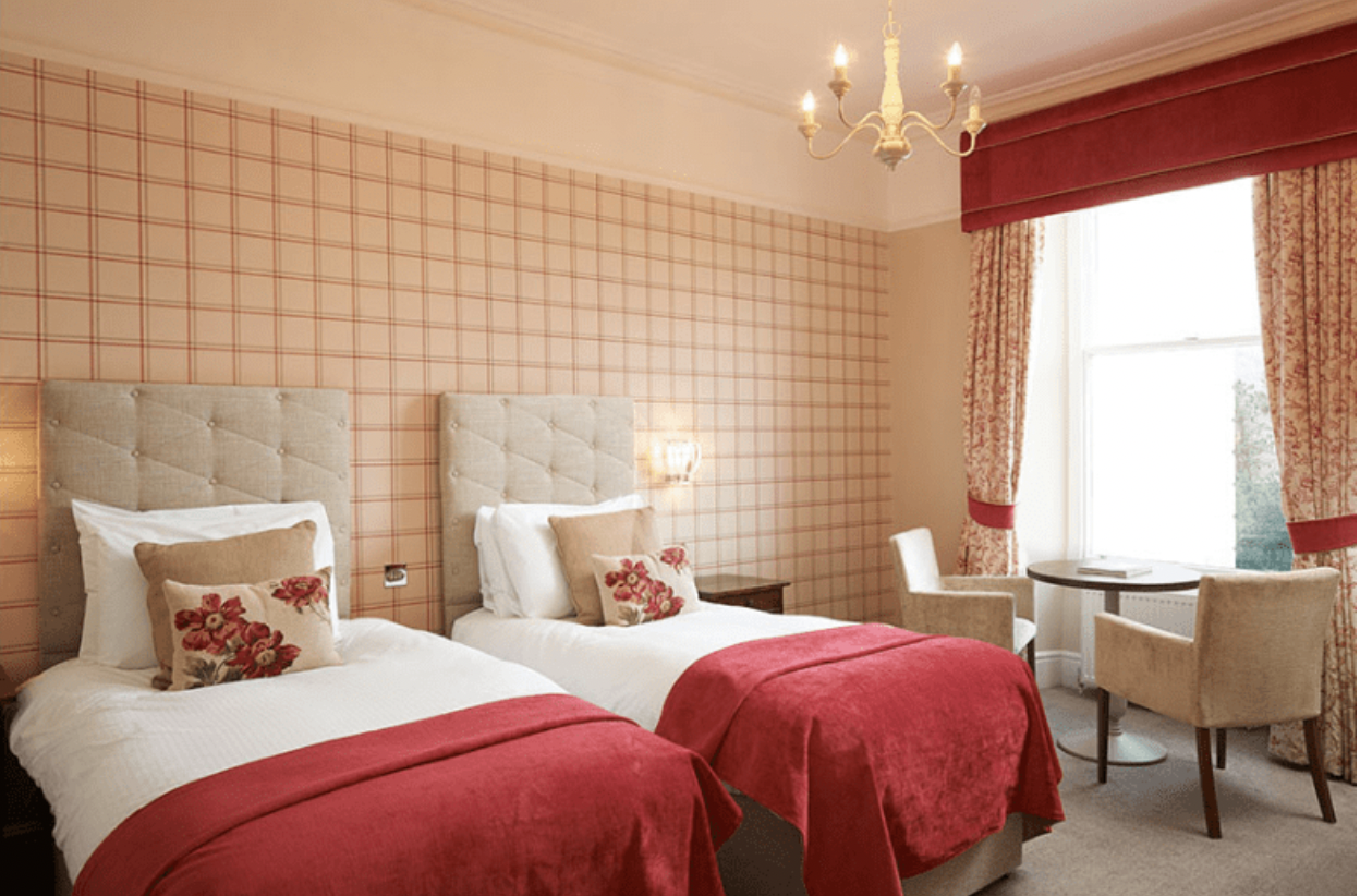 Representative twin bedroom at The Belsfield Hotel